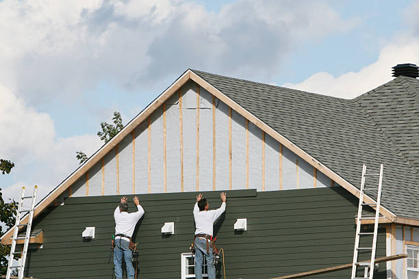Professional Siding Installation technician working in Warsaw, OH